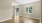 living room with wood flooring and windows