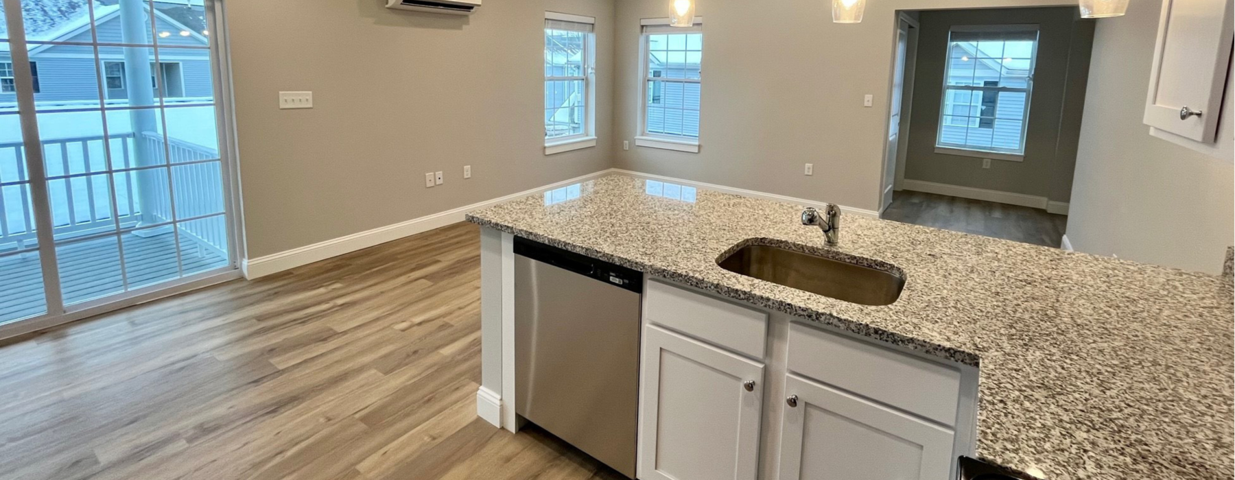 a kitchen with a wood floor