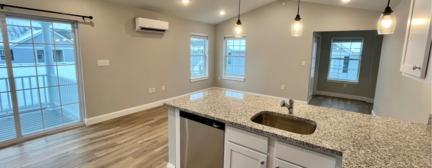 a kitchen with a wood floor