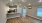 a kitchen with a wood floor